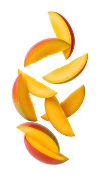 Flying fresh delicious mango slices floating PNG. Ripe sweet organic tropical fruit pieces isolated for healthy summer dessert recipes, natural vegan nutrition, and vibrant fresh market produce