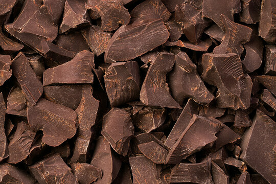 heap of broken bitter chocolate, dessert food background