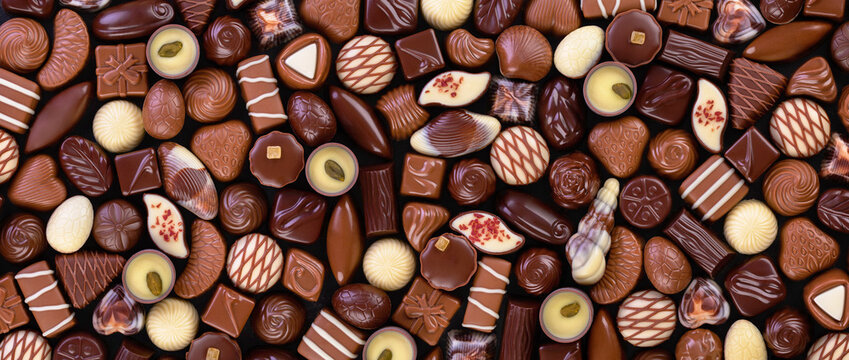 milk and dark chocolate candy background, gourmet sweet dessert.