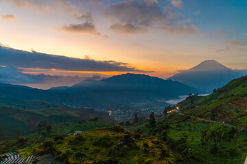 Obraz premium Beautiful morning, sunrise at Batu Angkruk Dieng, Wonosobo, Central Java, Indonesia.