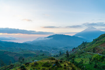 Fototapeta premium Beautiful morning, sunrise at Batu Angkruk Dieng, Wonosobo, Central Java, Indonesia.