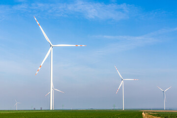Fototapeta premium Nice view of the windmill fields in Wielowiec in Poland.