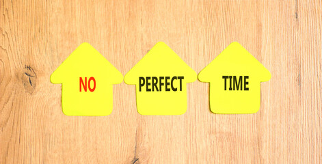 No perfect time words symbol. Concept words No perfect time on beautiful yellow paper houses. Beautiful wooden background. Business and no perfect time concept. Copy space.