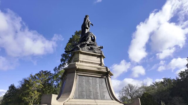 Boer War Memorial Statue in Cannon Hill Park, Birmingham.
A smooth, cinematic tracking shot of the Boer War Memorial (South African War Memorial) in Cannon Hill Park, Birmingham, UK.
