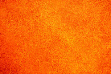 Obraz premium Orange grunge texture creating a vibrant warm abstract background