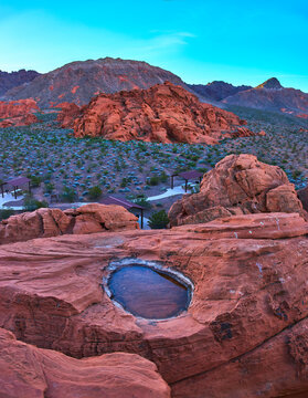 Redstone Dune Sunrise Panorama with Rock Basin Tinaja and Desert Landscape
