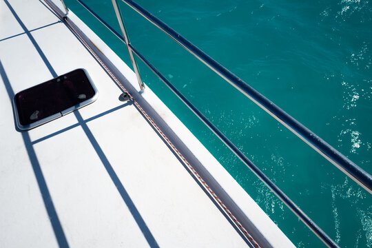 Views of the water and beaches on a catamaran sail boat on Sint Maarten island in the Caribbean Sea.