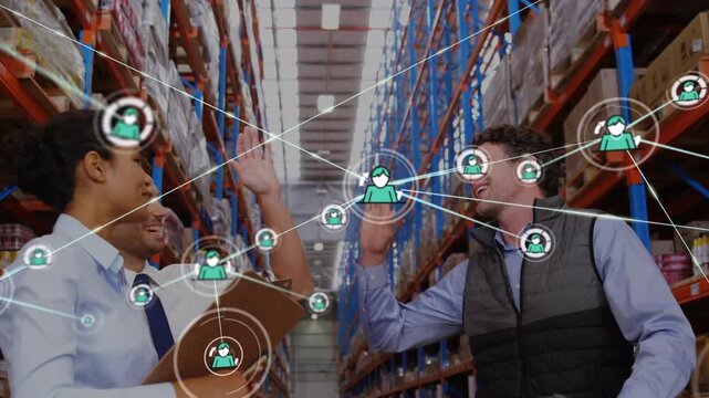 Animation of network of profile icon over diverse male and female supervisors high fiving each other