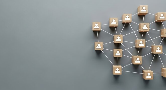 Professional business networking concept, wooden blocks with human icons connected by lines, corporate team structure and organizational hierarchy