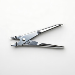 Obraz premium Close-up of a Shiny Metal Staple Remover tool on a White Background