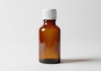 Fototapeta premium Brown glass bottle with white cap on white background isolated on white background