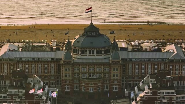 Aerial view of Scheveningen Beach in city Hague, Scheveningen Pier and famous Ferris wheel skyview de Pier