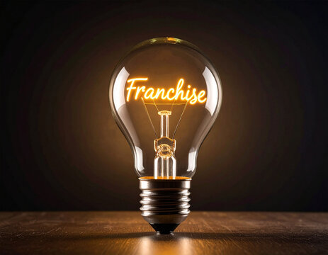 Glühbirne mit einem Glühdraht das aussieht wie das Wort "Franchise"