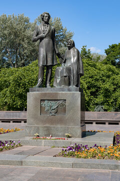 PSKOV, RUSSIA - JUNE 11, 2024: Monument "Pushkin and the peasant woman" on a sunny June day (vertically). Pskov