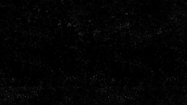 Dark grunge background animation featuring realistic chalk scratches, fine white veins, and subtle dust particles on black slate surface. Atmospheric texture for vintage title sequences, cinematic ove