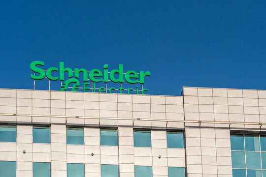 Almaty, Kazakhstan - September 05, 2025: A Schneider Electric sign on the roof of an office building