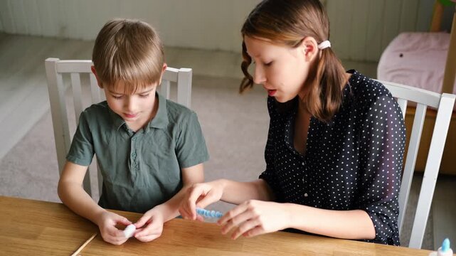 Happy Children Laugh and Fun Make DIY Toys. Kids Crafting from Fluffy wire, Bending Plush. Craft Pipe Cleaners. Leisure on Holidays. Thick Fluffy Chenille Stems for Arts. Supplies, Chenille Stems.