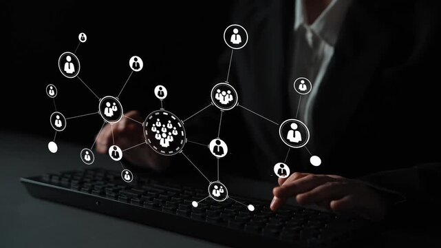 Digital storytelling concept with interconnected people icons and a keyboard representing online communication and networking in a dark setting Gluon.