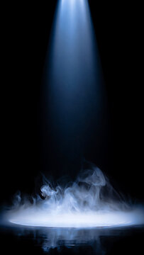 Dramatic spotlight with mystical smoke effect on black background perfect for theatrical productions and special event promotions with captivating atmosphere