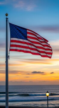 High Quality, Professional American flag waving on a pole by the ocean at sunset Stock Photo, AI Generated
