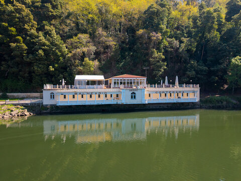 Balneario de cortegada reflecting on mi&ntilde;o river in galicia