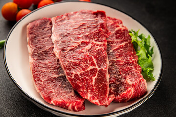 Fototapeta premium Raw beef steak marbled meat veal tasty snack fresh delicious gourmet food background on the table rustic food top view copy space
