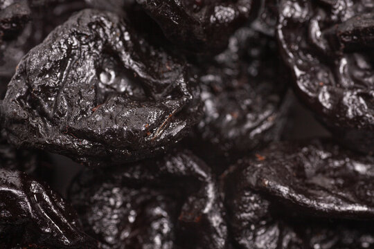Heap of dried prunes close-up