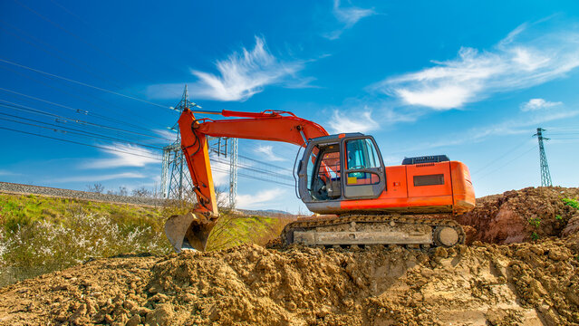 Construction site. Excavator dig the trenches. Trench for laying external sewer pipes