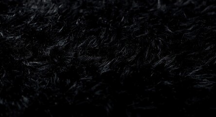 Fototapeta premium Close view on soft black shaggy fur carpet highlighting texture and depth