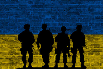 Fototapeta premium Conceptual image of war between Russia and Ukraine with shadow of soldier against wall with national flag background