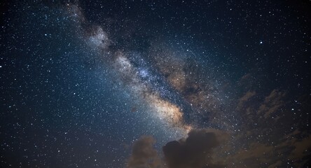 Fototapeta premium Natural phenomenon of Milky Way galaxy with stars and clouds at night copy space