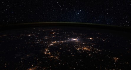 Fototapeta premium Nighttime view of illuminated Earth from orbit with glowing city lights and starry deep blue cosmos
