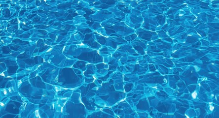 Fototapeta premium Rippling sunlight effects on deep blue pool water