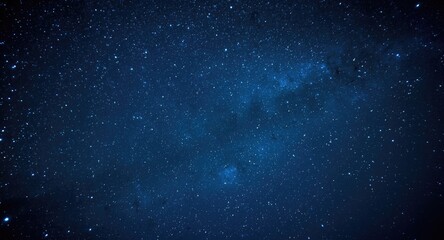 Obraz premium Night sky filled with radiant stars and swirling cosmic dust in blue hues