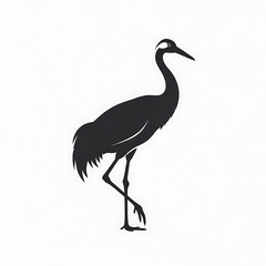 Fototapeta premium Black silhouette of a majestic crane standing tall