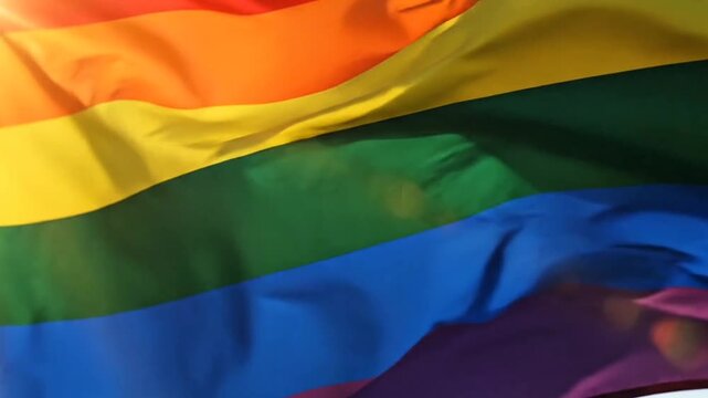Waving LGBT Rainbow Pride Flag Representing Diversity and Equality