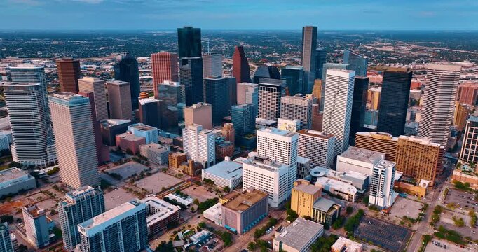 Wide aerial panorama of Houston downtown skyline and parking. Aerial view of skyscrapers and urban blocks with parking lots in Houston Texas city center