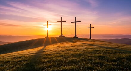 Obraz premium Four crosses on a hill at sunset with a blurred background