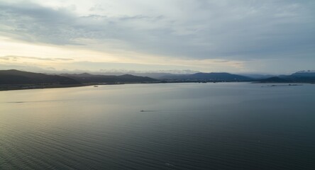 Fototapeta premium Large water expanse captured in a wide panoramic landscape view