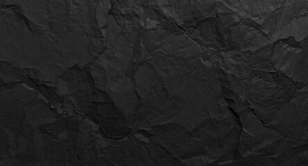 Fototapeta premium Smooth white crumpled paper grain on black backdrop for creative design and print use