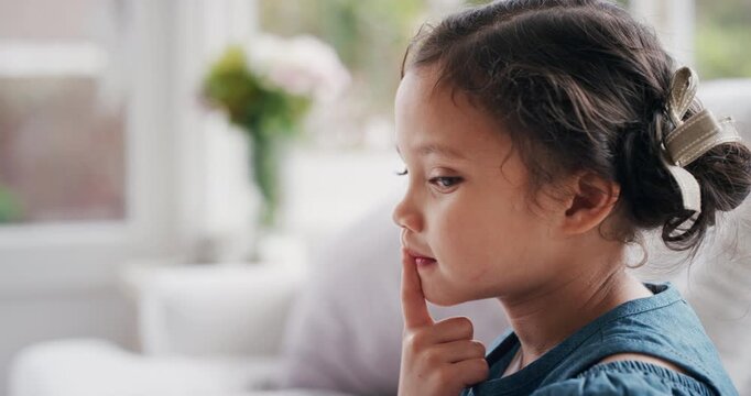 Idea, planning and thinking with girl child on sofa in home living room for development or future. Curious, vision and wonder with female kid in apartment for inspiration, problem solving or solution