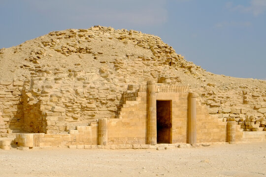 Saqqara, Egypt  Ancient tomb entrance in desert landscape in Egypt