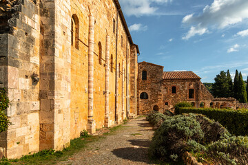 Naklejka premium Building walls of Abbazia di Sant'Antimo in Tuscany, Italy.