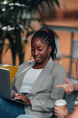 Young black woman collaborating using computer laptop