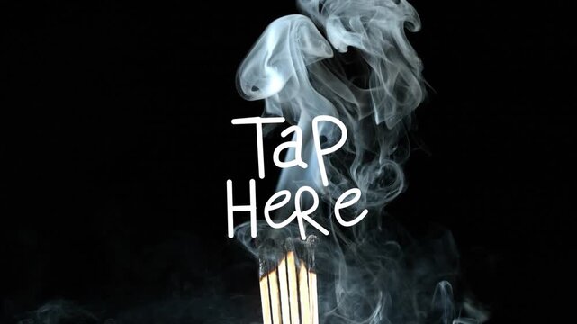 Animation of tap here text over matches on black background