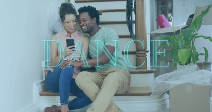 Animation of dance text over diverse couple using smartphone