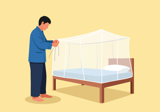 Man setting up white mosquito net over bed for malaria prevention and protection from insect bites during sleep in blue pajamas on yellow backdrop.