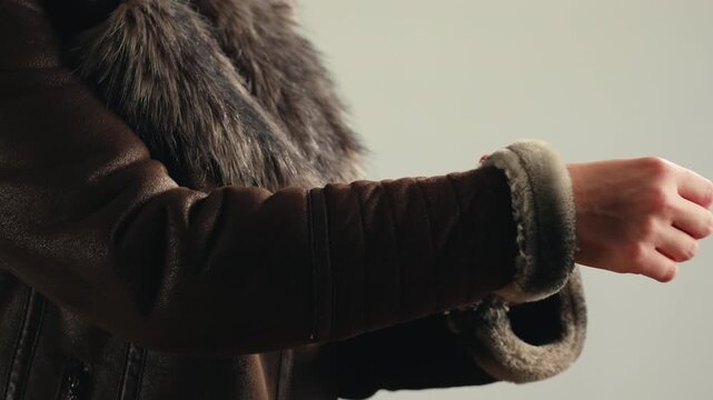 Texture of natural marten fur, luxury outerwear for women, soft fluffy surface of women's winter fur coat close-up for banners and posters.