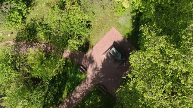 Vertical drone ascent above Tchaikovsky monument