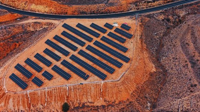 Diverse length rows of modern photovoltaic cells. Sustainable energy concept. Aerial view.